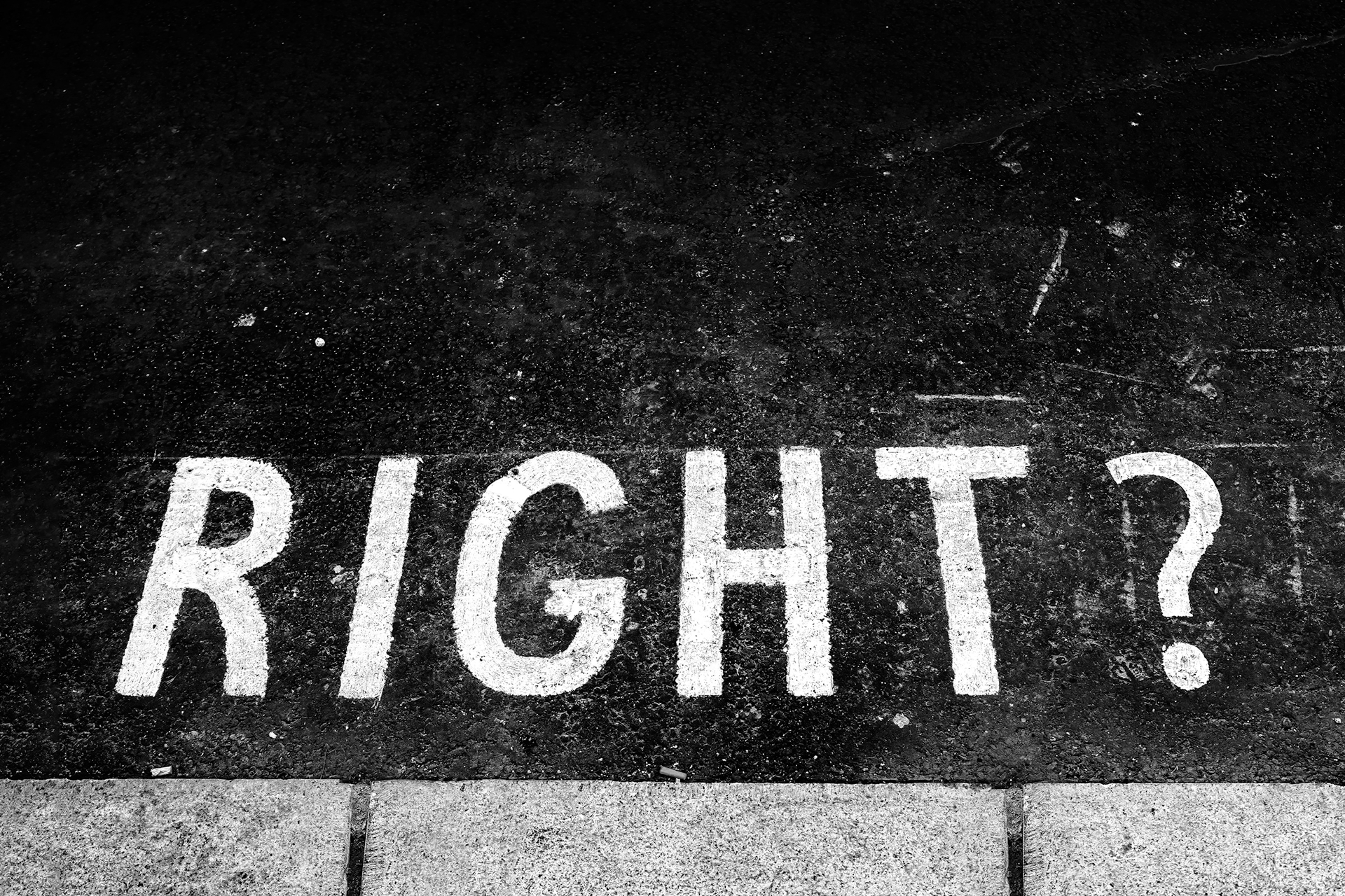“RIGHT?” painted on pavement