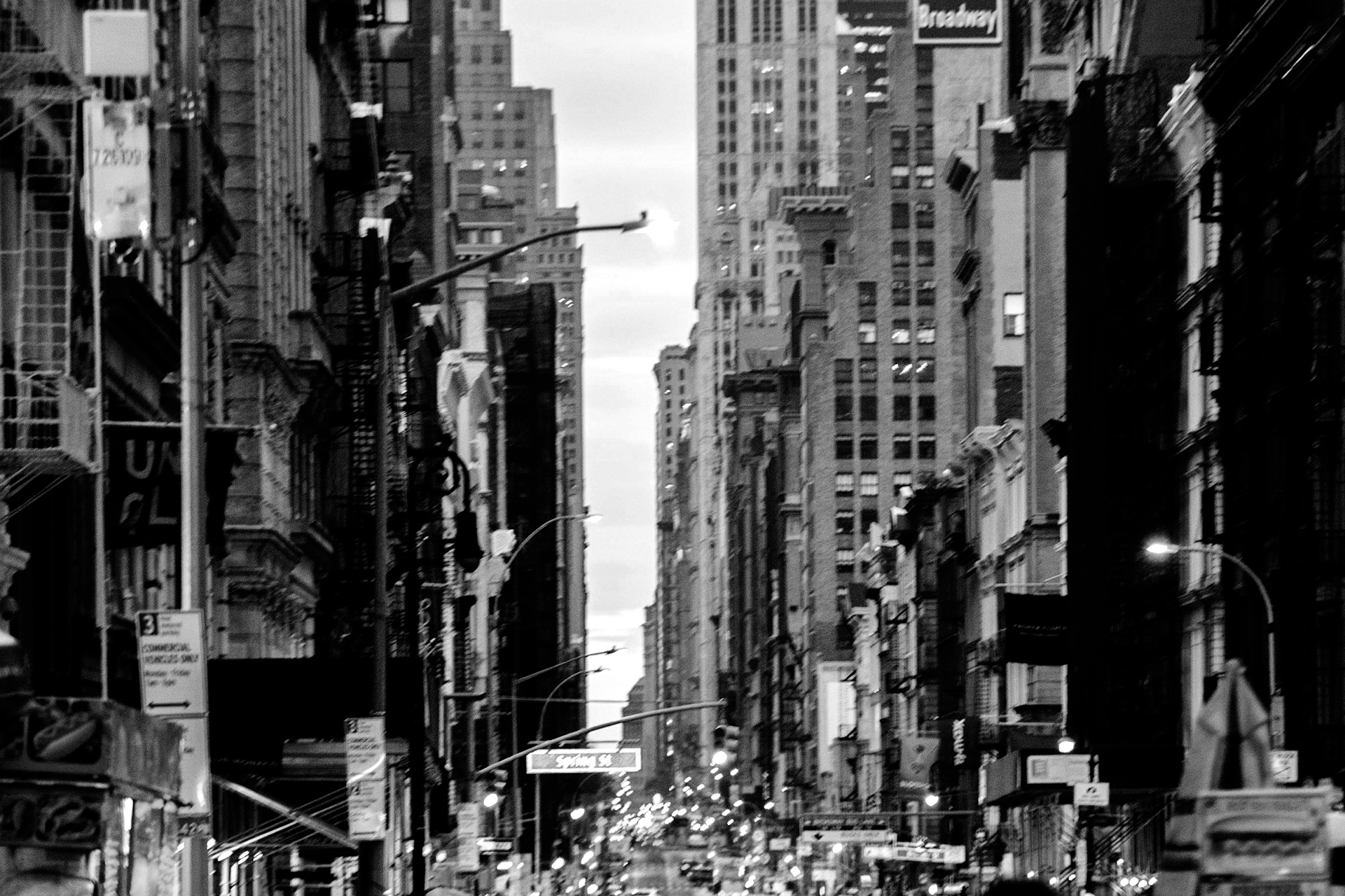 Crowded city scene on Broadway in New York City; equal parts urgency, action, and a complete standstill