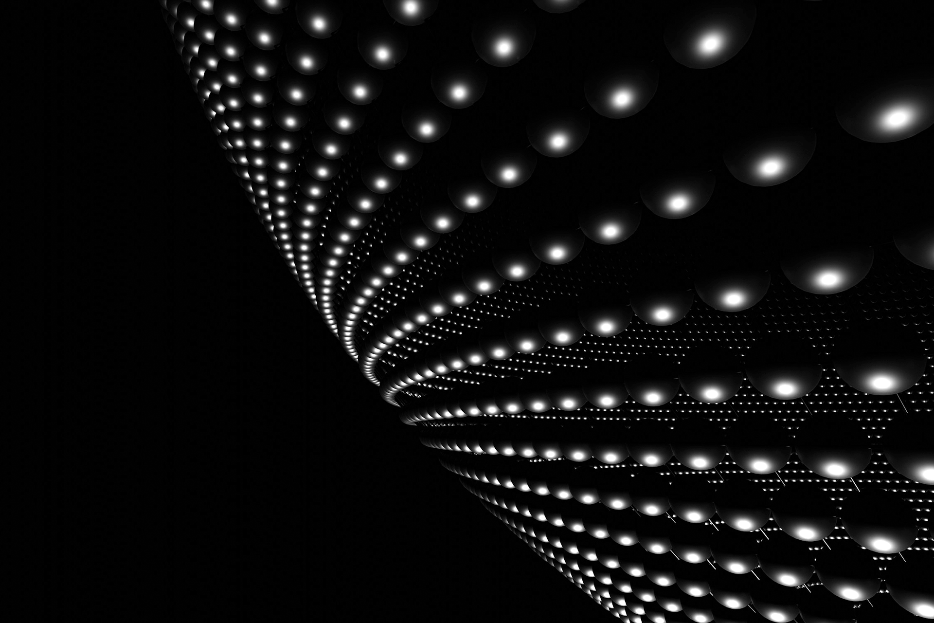 Three-dimensional view of lights and grid lines wrapping around a sphere