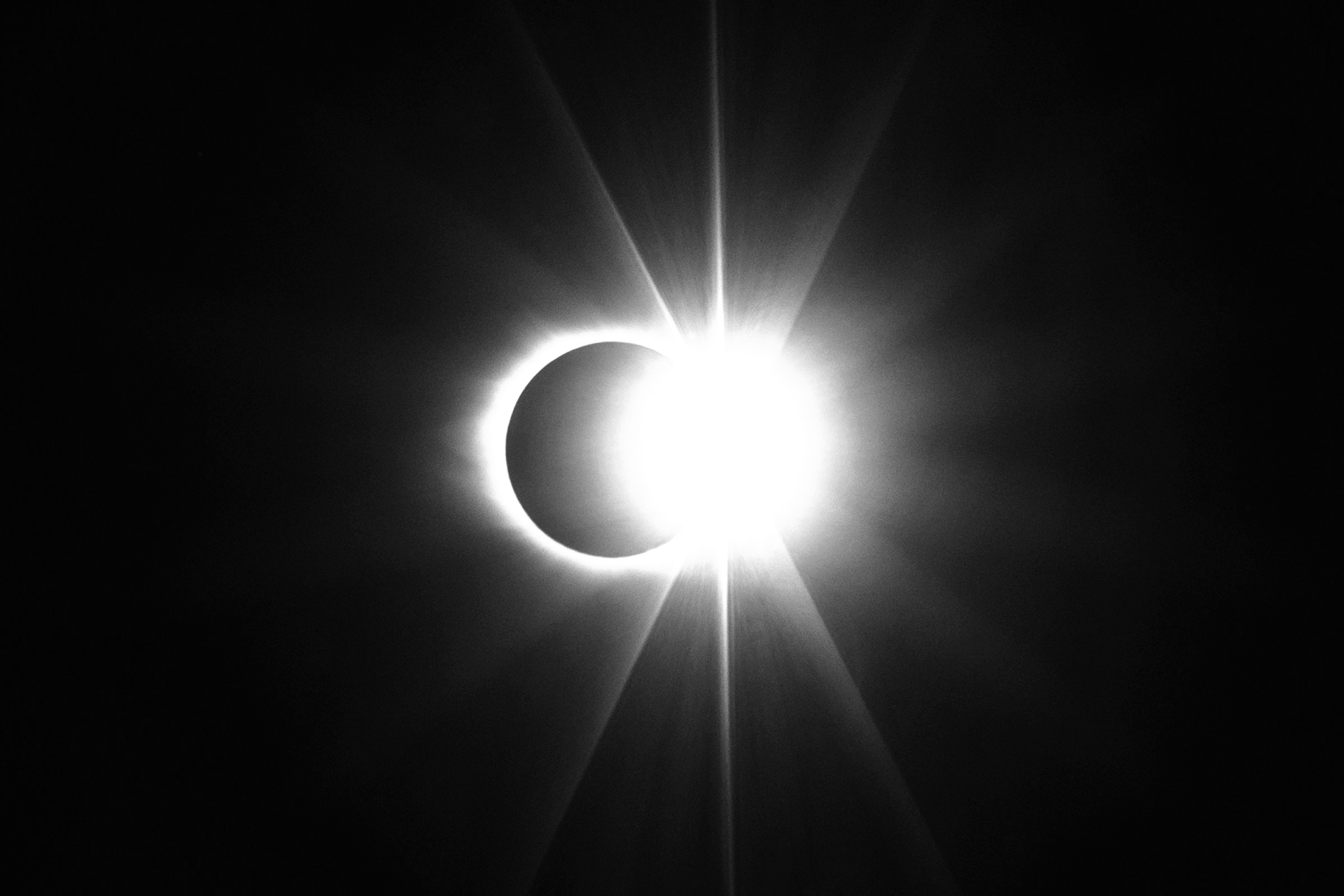 A black and white photo of an eclipse